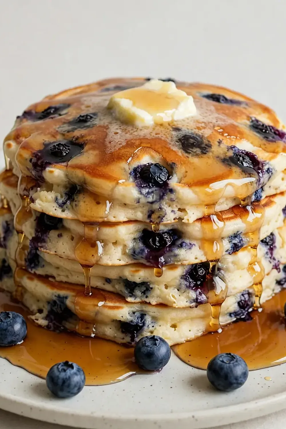 Fluffy Blueberry Pancakes with Maple Syrup
